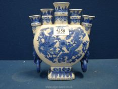 A vintage Chinese porcelain blue and white fine neck flask 8½" tall.