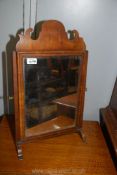 An attractive Georgian Walnut and Mahogany swing Mirror, 22'' tall.