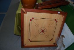 A 'Carrom' board game, counters and Carrom powder, the board being 33" x 33".