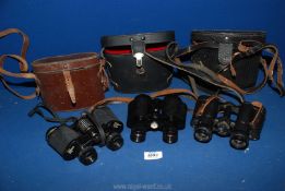 Three cased binoculars to include USSR 8x30,