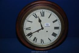 A wall clock with Roman numerals.