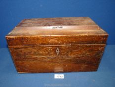 An Oak tea caddy, with two internal boxes, leather lined to interior of lid,
