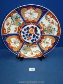 A large Imari charger with stand, 14 1/2" diameter.