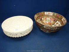 A hand-painted Chinese bowl with old repairs, together with a heavy cream coloured cake stand.