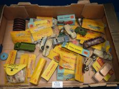 A box of Dinky Toy cars, trucks and boxes, play worn, a/f.