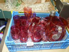 A quantity of cranberry glass to include; small tumblers, wine glasses, sugar sifter,