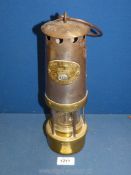 A brass and metal E. Thomas & Williams Ltd. Aberdare miners lamp, 12 1/2" high.