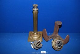 A brass column lamp without glass (top a/f), brass oil light fittings and cast shoe lasts.