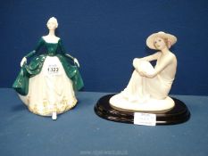 A Royal Doulton 'Regal Lady' no. 2708, together with a Leonardo Collection Annie Rowe figure.