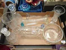 Three large glass vases, four stemmed vases, two decanters and a trifle bowl.