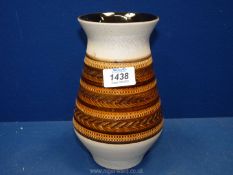 A German vase with glazed chevron band to the middle and cream matt finish to the rest, 8" tall.