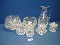Two cut glass bowls, a cut glass jug, four glass preserve jars with lids,