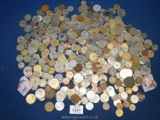 A good quantity of foreign coins including French, American, Canadian.