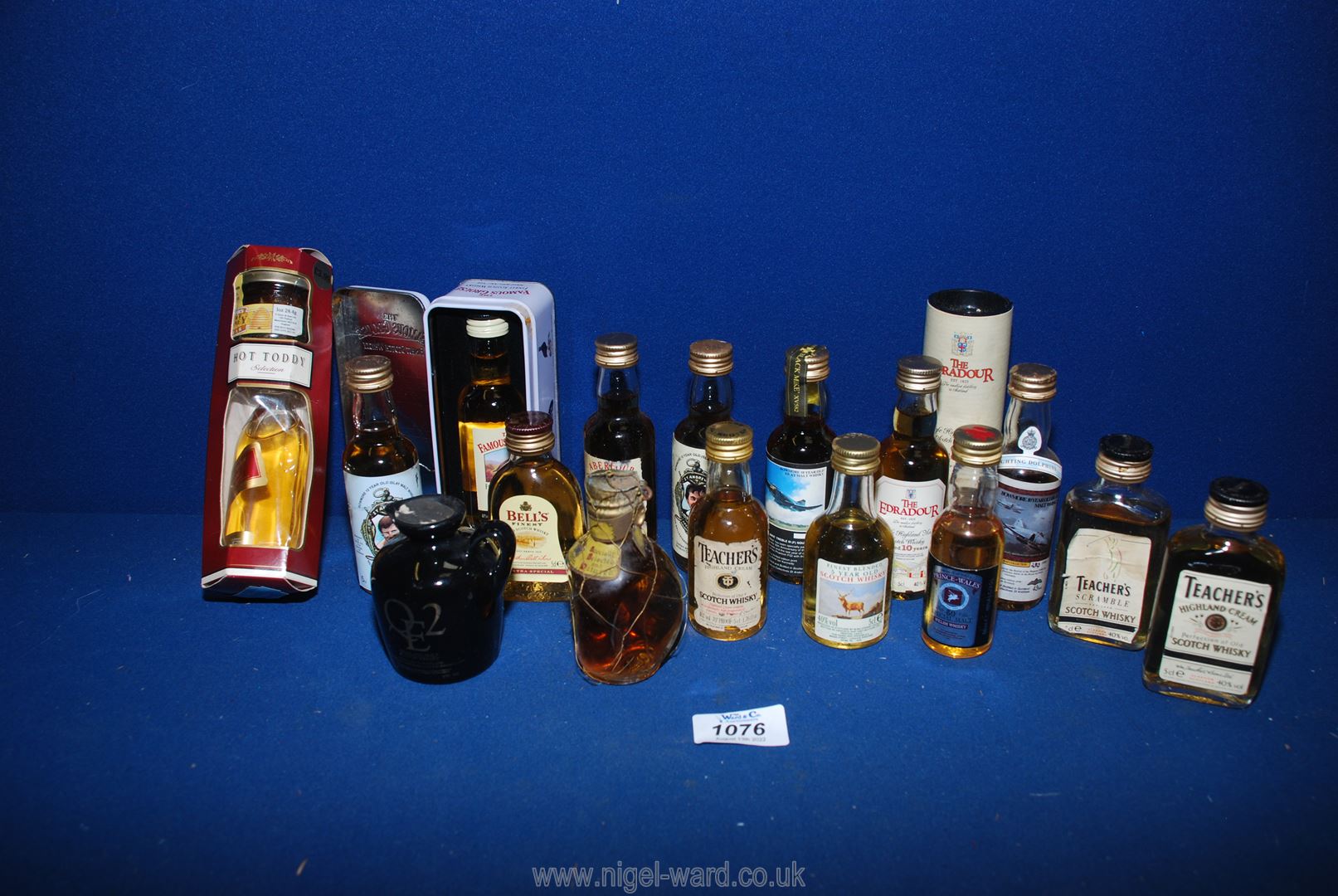 A small quantity of Scotch whisky miniatures including 'The Famous Grouse' in tin, Teacher's,