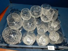 A quantity of cut glasses including brandy, whisky and wine ,