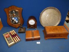 A quantity of miscellanea including an inlaid mantle clock, cast metal ornament,