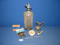 A small quantity of miscellanea including metal cased soda siphon with sparklets bulbs,
