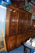 A good quality contemporary breakfront Mahogany Bookcase over Cupboards,