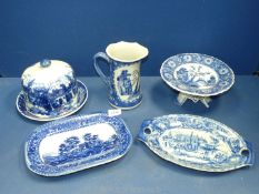 Four pieces of blue and white china to include an oriental jug and cake stand with character mark