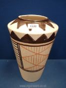 A West German ceramic vase of tapered cylindrical form decorated with linear patterns,