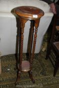 A Mahogany bobbin turned jardiniere Stand, 41" tall.