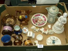 A quantity of china including lusterware mugs and jugs, souvenir ware including pigs,