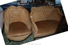 A stylish buttoned back two seater Sofa and matching Armchair standing on brief cabriole legs and