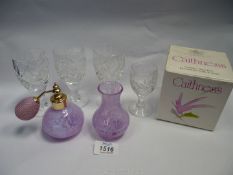 A Caithness atomiser in mottled purple swirl pattern, a similar Caithness posy vase,