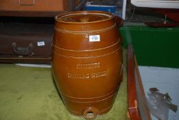 A stoneware 'Etherium Drinking Water barrel', tap not present, 16" tall.