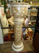 A large lustre effect jardiniere on marble effect column, made in Italy, 41" tall x 13" diameter.