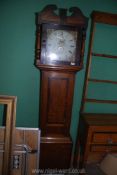 A cross-banded Oak cased 30 hour longcase Clock, the painted face with Roman numerals,