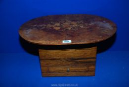 A marquetry sewing box having flip top lid with flower decoration,