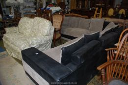 A stylish modern corner Lounge Suite comprising a pair of three seater settees and a corner unit,