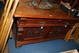 An extremely heavy rich gold Oak Sideboard/serving Table having a pair of frieze drawers with blind