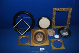 A quantity of old picture frames and two small gold leaf miniature portrait mounts.