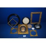 A quantity of old picture frames and two small gold leaf miniature portrait mounts.