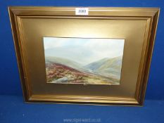 A framed and mounted watercolour depicting a highland scene, signed lower right 'F. Parr'.