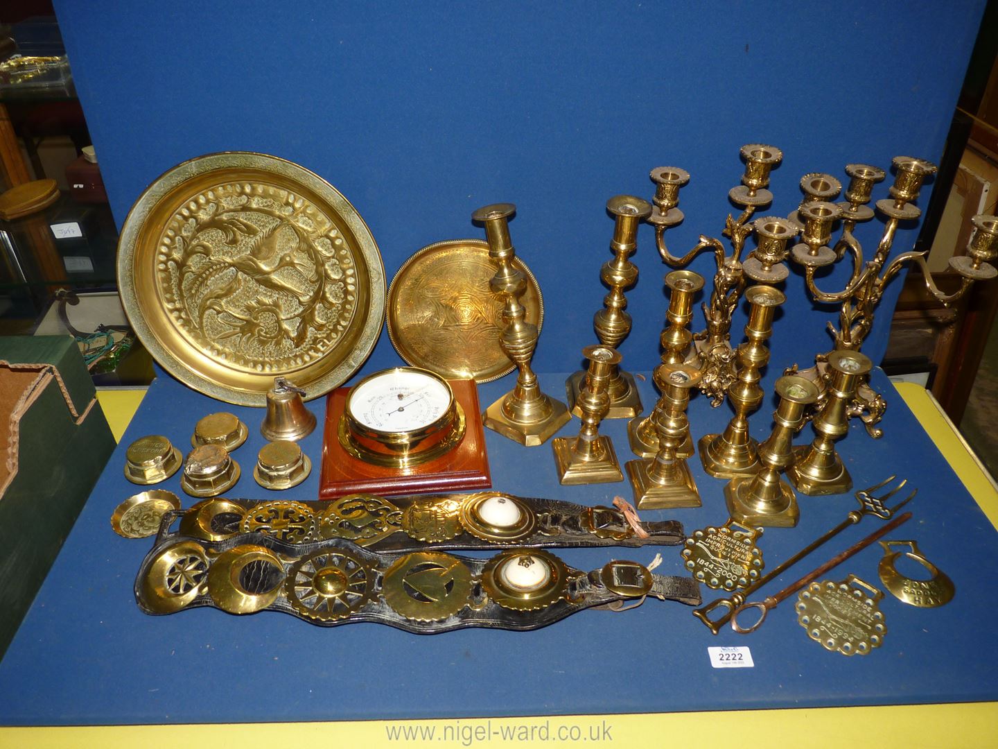 A good quantity of brass including candlesticks, candelabra, horse brasses, plate, barometer etc.