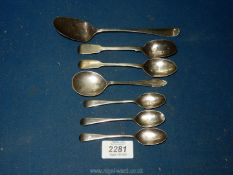 Seven silver spoons including three teaspoons marked Sheffield 1909, jam spoon Sheffield 1962,