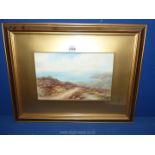 A framed and mounted watercolour depicting a coastal scene, signed lower left 'F. Parr'.