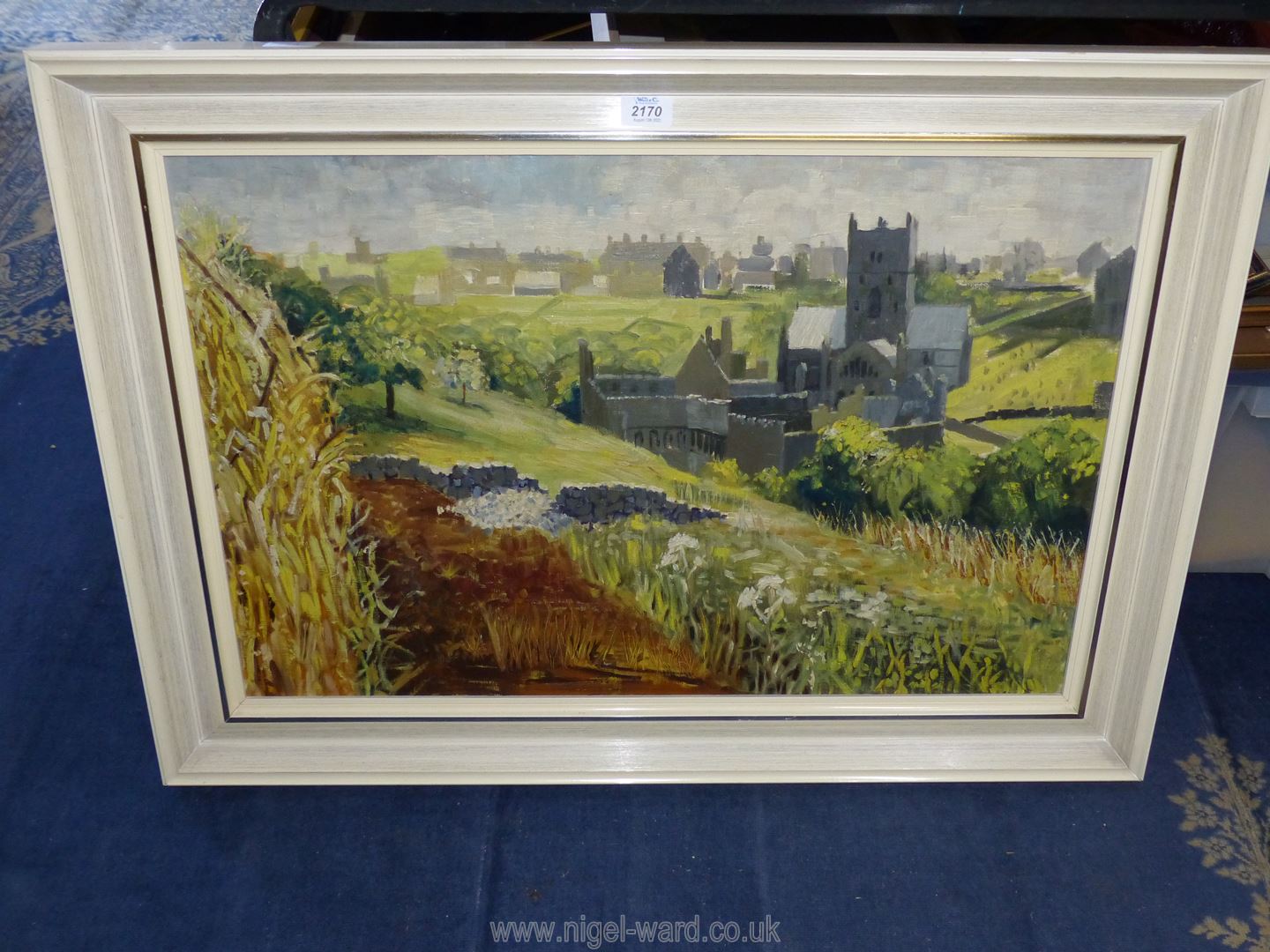 A large framed oil on canvas depicting St David's Cathedral, no visible signature,