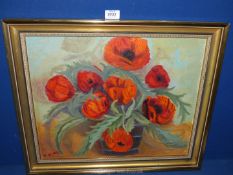 An oil on board of Poppies, signed.