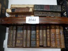 A wooden trug containing Poetical works.