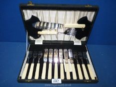 A boxed fish set including fish servers, six fish knives and forks.