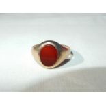 A lady's 9ct gold ring set with a bloodstone,