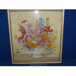 A framed watercolour depicting a still life of flowers, signed ,lower left 'Dorcie Sykes'.