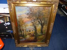 A large gilt framed oil on canvas with two figures walking livestock through woodland towards