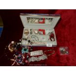 A quantity of costume jewellery to include; brooches, earrings, bracelets, necklaces, etc.