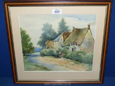 A framed and mounted watercolour depicting cottages and two ladies talking over a garden gate,