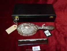 A cased silver brush and comb, Birmingham, 1979.